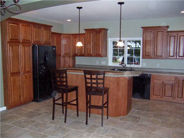 Hickory cabinets - Raised panel doors - Standard overlay style - Laminate countertops